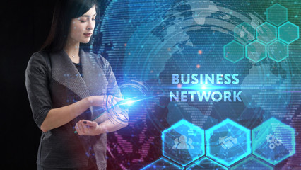 Business, Technology, Internet and network concept. Young businessman working on a virtual screen of the future and sees the inscription: Business network