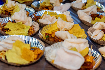 Served Food on Plastic Plates at Party