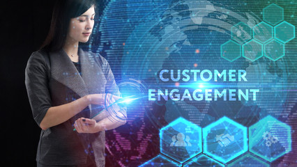 Business, Technology, Internet and network concept. Young businessman working on a virtual screen of the future and sees the inscription: Customer engagement