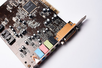 Fototapeta premium Computer Board, microchip, motherboard close-up on a white background. Chip, computer parts