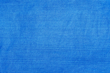 Light blue denim fabric photographed close up