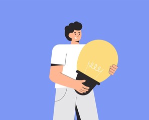 Young happy smiling male character is holding a big yellow light bulb. Imaginary idea, plan concept. Vector illustration in a flat style isolated.