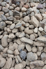 The rocks are piled at the outdoor sale.