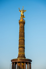 Fototapeta na wymiar Golden satue and berlin Victory Column, a monument to commemorate the Prussian victory in the Danish-Prussian War and defeated Austria and Austro-Prussian War & France