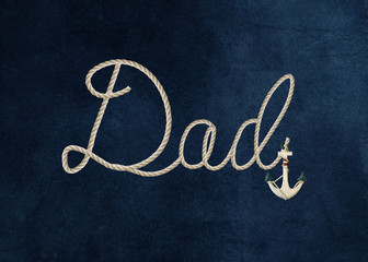 wooden nautical anchor symbol on Dad text in rope design