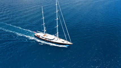 Aerial drone photo of sail yacht sailing the Aegean deep blue sea, Greece