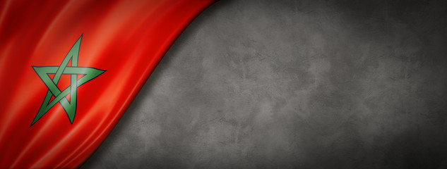 Moroccan flag on concrete wall banner