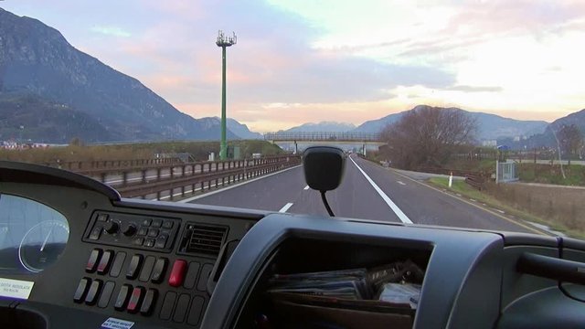 Video shot from a bus windshield during the trip on a road and crossing a mountain on the Brenner pass, Italy-Austria border.
