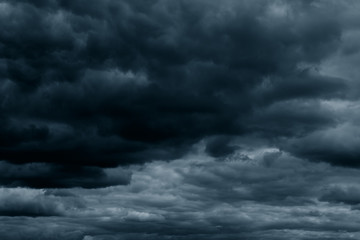 Stormy rain big fluffy clouds. Dark sky. Natural scenic abstract background. Weather changes backdrop. Sky filled with voluminous clouds.