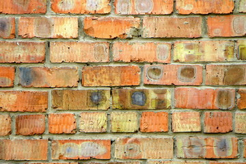 Obraz premium Old brick wall, old texture of red stone blocks closeup 1