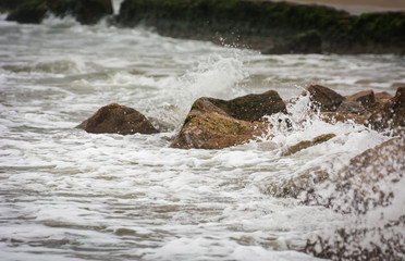 waves on the rocks at Tharangampadi