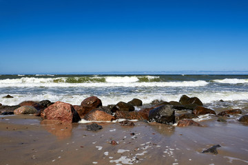 Fototapeta na wymiar Waves and stones
