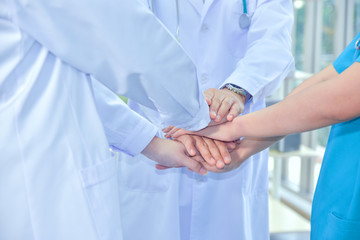 Team Doctors nurses union coordinate hands Teamwork Concept  at hospital success partner community