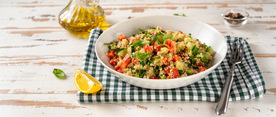 A plate with summer refreshing and healthy couscous salad