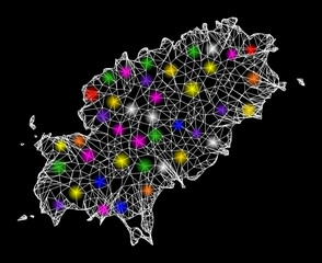 Web mesh vector map of Ibiza Island with glare effect on a black background. Abstract lines, light spots and points form map of Ibiza Island constellation.