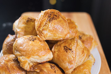 Oven baked traditional uzbek samsa meat on tray