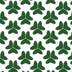 
Abstract pattern. Green shamrocks. Vegetable stylized elements. Wallpaper.