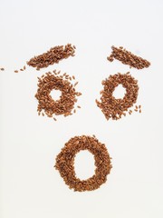 Flax seeds laid out in the form of emotions due to diet.