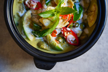 Close up green Chicken Curry with Thai ingredients ,Thai cuisine, top view of Green Chicken Curry
