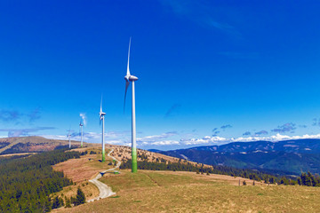 Wind turbines summer autumn landscape. Concept: Green power energy generation, wind farm