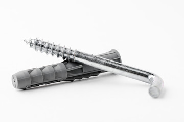 Metal hooks screws isolated on a white background. Concept of repair and construction