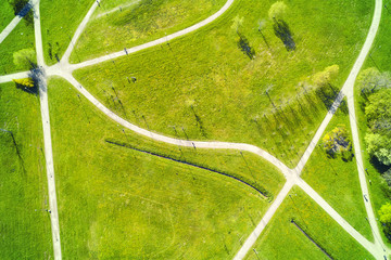 Paths in the green summer park top aerial view