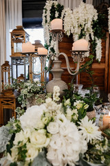 Table decor with flowers for a wedding party