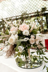 Obraz na płótnie Canvas Table decor with flowers for a wedding party