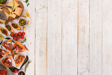 Traditional Greek food on vintage wooden background. Top view.
