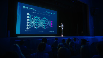 Computer Science Startup Conference: On Stage Speaker Does Presentation of New Product, Talks about Deep Learning, Shows New AI, Big Data and Machine Learning App on Big Screen. Live Event