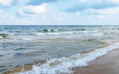 Waves at sea or ocean in the evening.