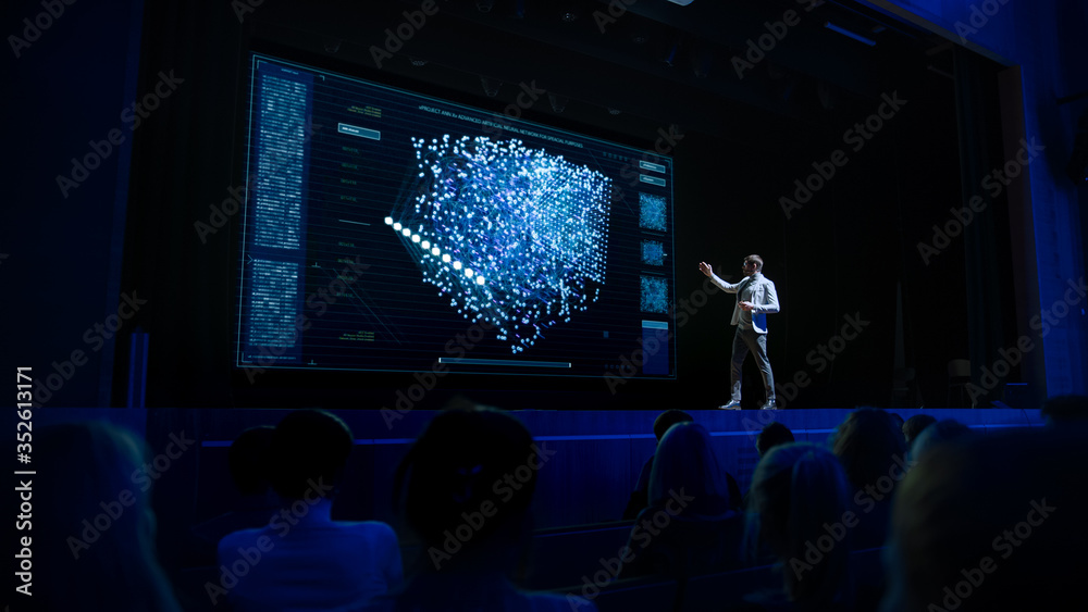Wall mural computer science startup conference: on stage speaker does presentation of new product, talks about 