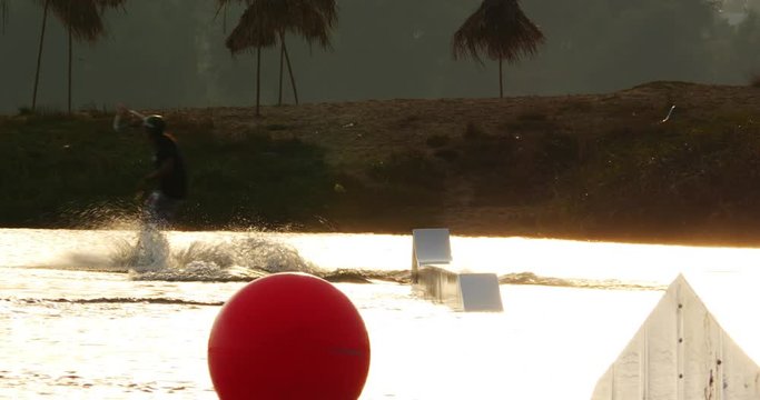 Sunset wakeboarding in 4k.