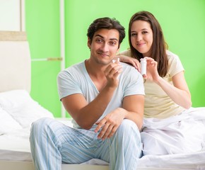 Man using pills for woman satisfaction