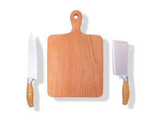Natural wooden cutting board with a knife, kitchen tools.