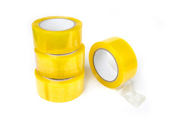 Roll of a transparent scotch tape on a white background