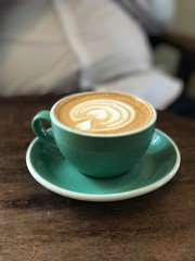 Coffee latte art in mug