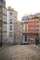 Montmartre Paris hill street  with streetlamps