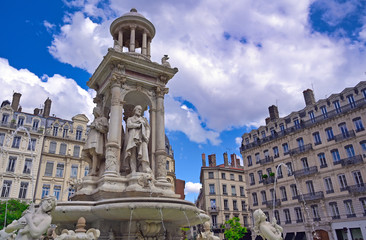 Fototapeta na wymiar The fountain on Place des Jacobins in the heart of Lyon, France.