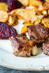 Lamb Steak with Roasted Baked Beet Slices and Potatoes / Turkish Kuzu Lokum or Delight served with Plate.