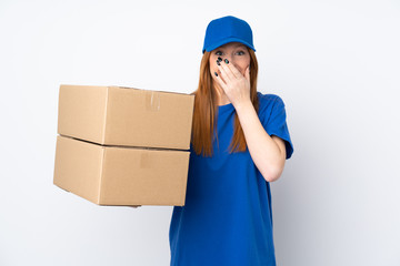 Young delivery woman over isolated white background with surprise facial expression