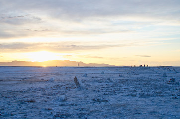 The empty and plain open landscape of the cool cold salt lake salt flats.