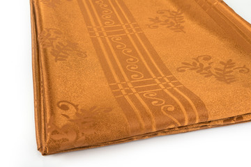 Fabric with pattern folded on a white background