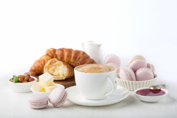 Fresh delicious breakfast with coffee and  croissants