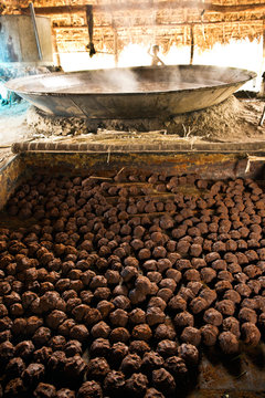 Jaggery making in process - in a traditional indian kitchen.