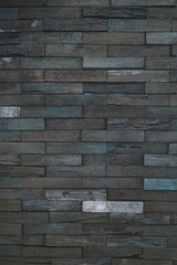 Decorative wall texture of Seamless wood wall, vintage exposed wooden wall exterior, patchwork of raw wood forming a beautiful parquet wood pattern.
