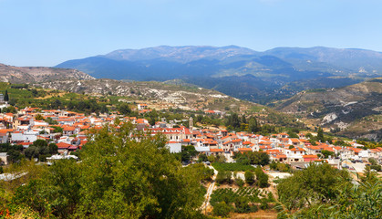 Fototapeta na wymiar Cyprus, view to the village of Omodos is the Monastery of the Holy cross and the Troodos mountains