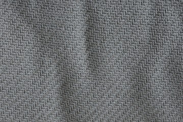Gray fabric background  from a crumpled piece of cloth
