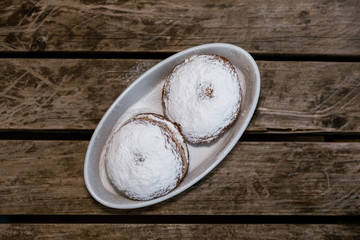 Top view close up of sugary donuts