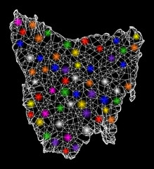 Web mesh vector map of Tasmania Island with glare effect on a black background. Abstract lines, light spots and circle dots form map of Tasmania Island constellation.
